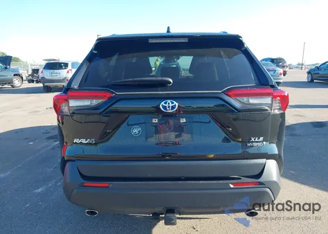 2021 Toyota Rav4 Hybrid Xle from USA, damaged, VIN JTMRWRFV5MD127435
